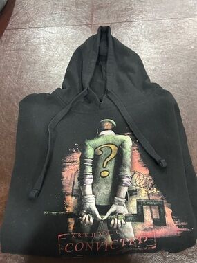 The Riddler Black Hoodie with Green & Yellow Graphic. Soft and warm.